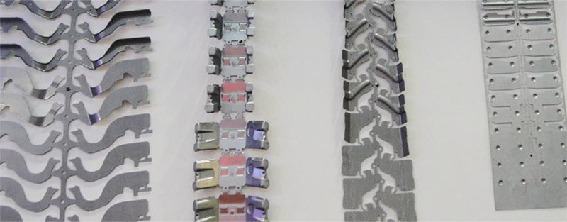 Línea de obturación para piezas de estampado de metal